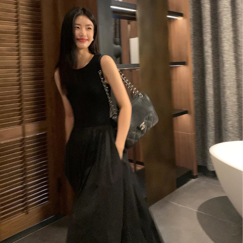 Vestido midi negro con bolsillos