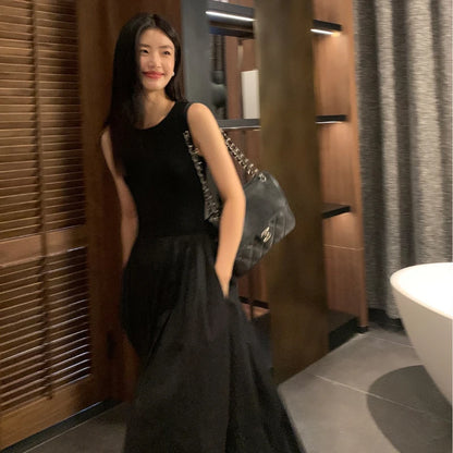 Vestido midi negro con bolsillos