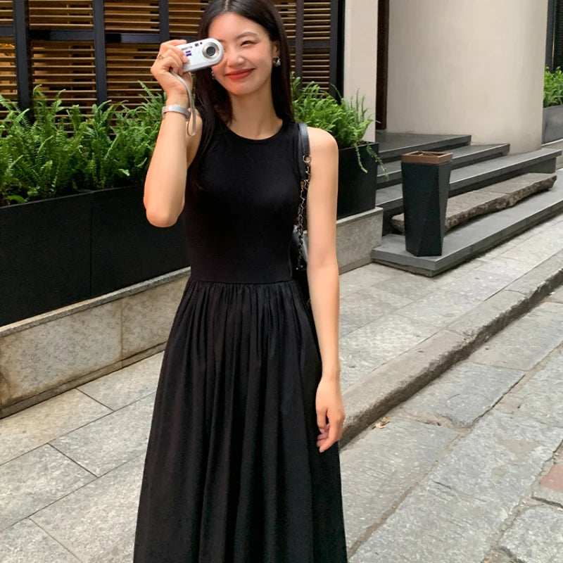 Vestido midi negro con bolsillos