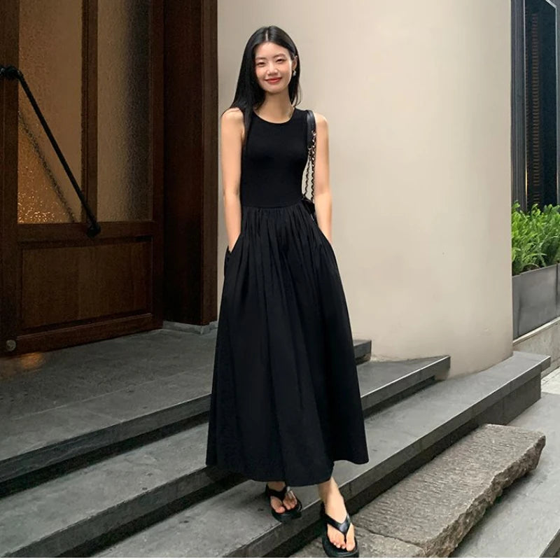 Vestido midi negro con bolsillos